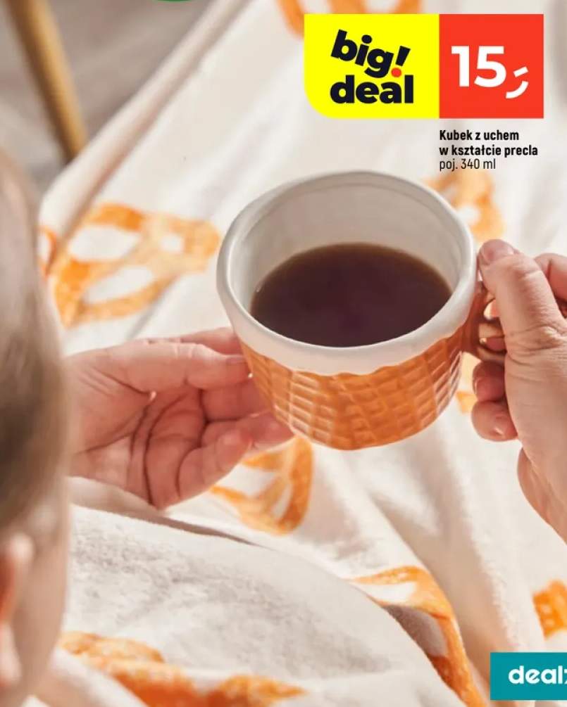 Kubek z uchem w kształcie precla